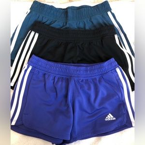 3 pairs of women’s adidas shorts! Great condition. Black, purple, green. XS